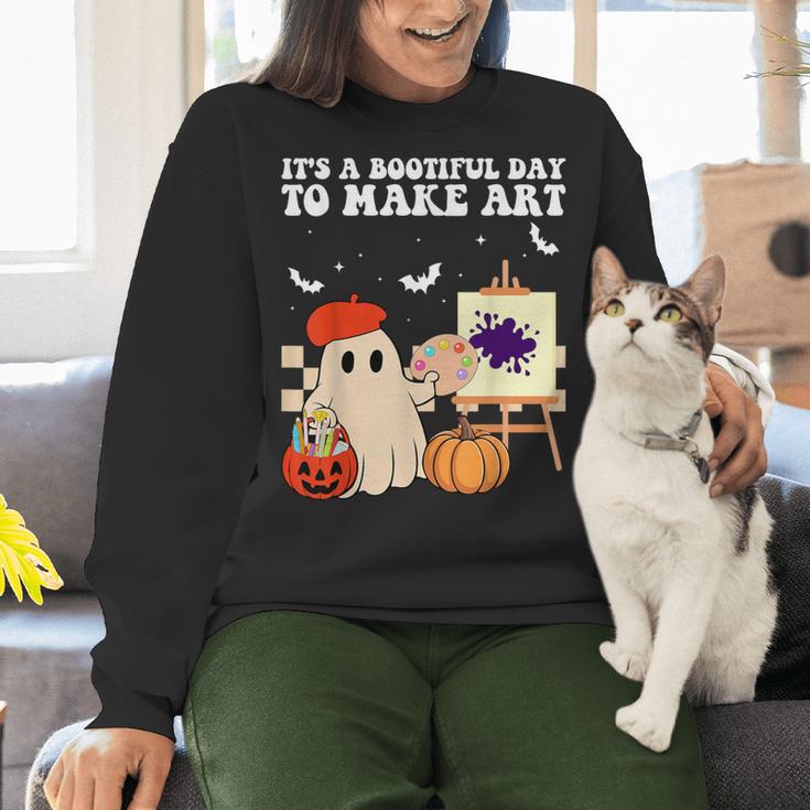 It's A Bootiful Day To Make Art Groovy Art Teacher Halloween Women Crewneck Sweatshirt, Groovy Teacher Sweatshirts, gift for family, gift for coworker