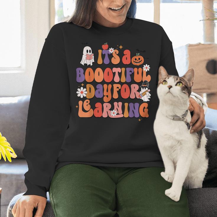 It's A Bootiful Day For Learning Cute Teacher Halloween Women Crewneck Sweatshirt, gift for family, gift for coworker It's A Bootiful Day For Learning Cute Teacher Halloween Women Crewneck Sweatshirt, gift for family, gift for coworker
