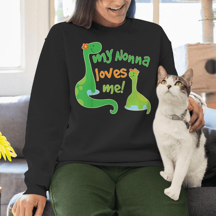 Kids My Nonna Loves Me Dinosaur Grandson Women Crewneck Sweatshirt, gift for family, gift for coworker