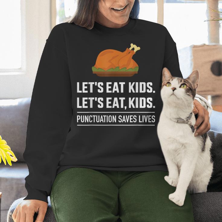 Let's Eat Kids Grammar For Thanksgiving Teacher Women Crewneck Sweatshirt, gift for family, gift for coworker Let's Eat Kids Grammar For Thanksgiving Teacher Women Crewneck Sweatshirt, gift for family, gift for coworker
