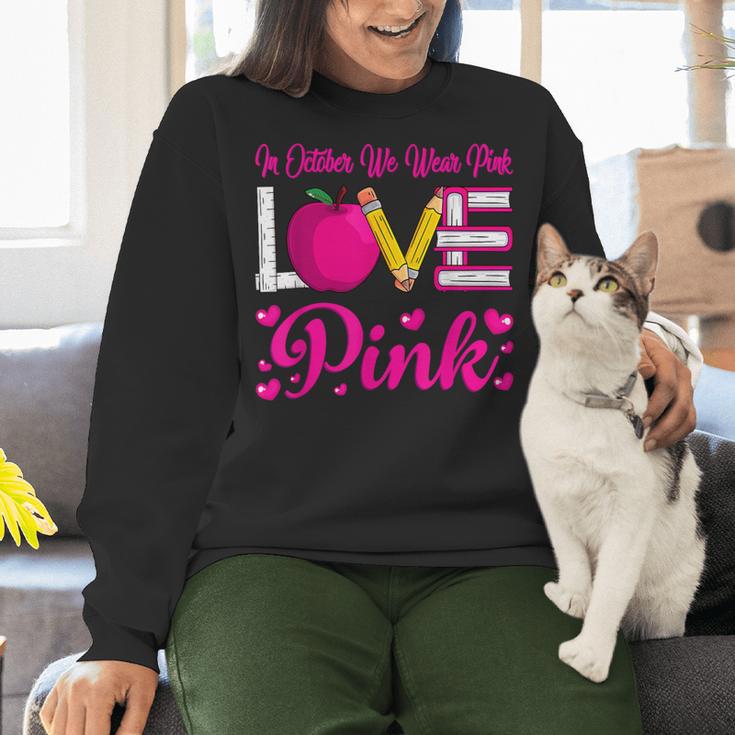 In October We Wear Pink Love Teacher Breast Cancer Awareness Women Crewneck Sweatshirt, gift for family, gift for coworker