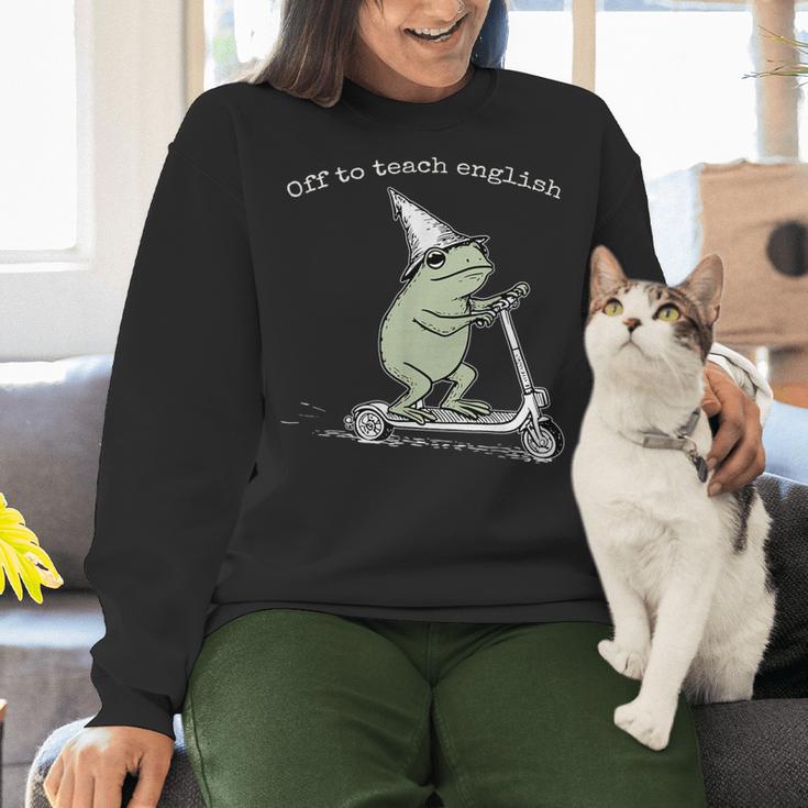 Off To Teach English Scooter Frog ESL Teacher Literature Women Crewneck Sweatshirt, Esl Teacher Sweatshirts, English Teacher Sweatshirts, gift for family, gift for coworker Off To Teach English Scooter Frog ESL Teacher Literature Women Crewneck Sweatshirt, Esl Teacher Sweatshirts, English Teacher Sweatshirts, gift for family, gift for coworker