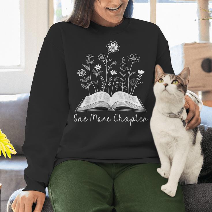 One-More Chapter Wildflower Reading Teacher Library Bookish Women Crewneck Sweatshirt, gift for family, gift for coworker One-More Chapter Wildflower Reading Teacher Library Bookish Women Crewneck Sweatshirt, gift for family, gift for coworker