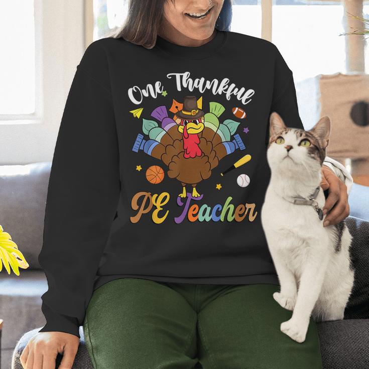 One Thankful PE Teacher Turkey Thanksgiving -Adults & Kids Classic Fit Polyester 100 Short Sleeve Women Crewneck Sweatshirt, Pe Teacher Sweatshirts, gift for family, gift for coworker One Thankful PE Teacher Turkey Thanksgiving -Adults & Kids Classic Fit Polyester 100 Short Sleeve Women Crewneck Sweatshirt, Pe Teacher Sweatshirts, gift for family, gift for coworker