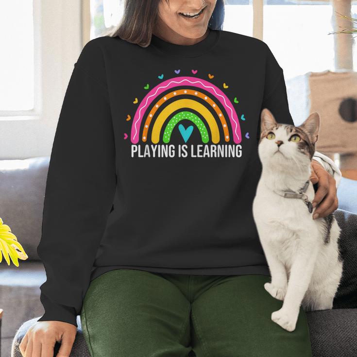 Playing Is Learning Early Childhood Education ECE Teacher Women Crewneck Sweatshirt, gift for family, gift for coworker
