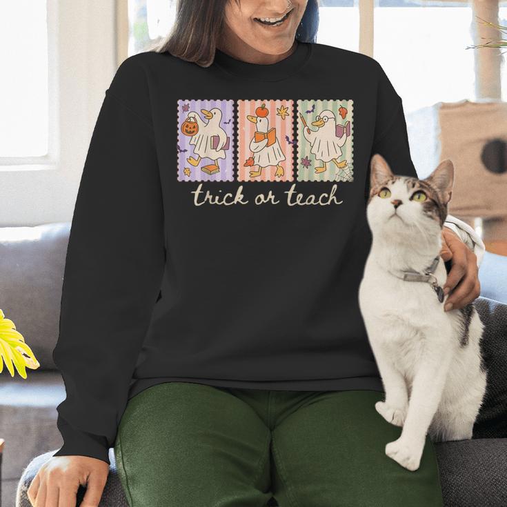 Preppy Goose Teacher Trick Or Teach Halloween Teacher Goose Women Crewneck Sweatshirt, gift for family, gift for coworker Preppy Goose Teacher Trick Or Teach Halloween Teacher Goose Women Crewneck Sweatshirt, gift for family, gift for coworker