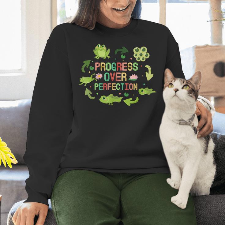 Progress Over Perfection Frog Back To School Teacher Women Crewneck Sweatshirt, gift for family, gift for coworker Progress Over Perfection Frog Back To School Teacher Women Crewneck Sweatshirt, gift for family, gift for coworker