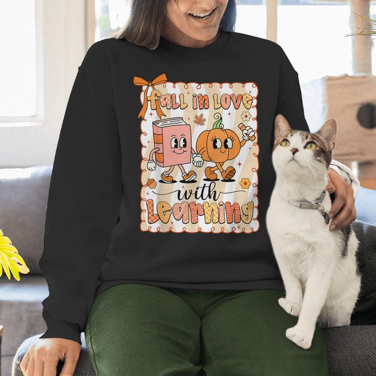 Pumpkin Teacher Preppy Fall In Love With Learning Autumn Women Crewneck Sweatshirt, gift for family, gift for coworker
