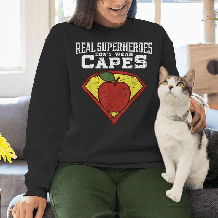 Real Superheroes Don't Wear Capes Teacher Shirt Teaching Te Women Crewneck Sweatshirt, gift for family, gift for coworker Real Superheroes Don't Wear Capes Teacher Shirt Teaching Te Women Crewneck Sweatshirt, gift for family, gift for coworker