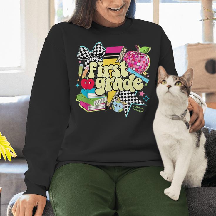 Retro First Grade Teacher Disco Ball Coquette Back To School Women Crewneck Sweatshirt, First Grade Teacher Sweatshirts, gift for family, gift for coworker