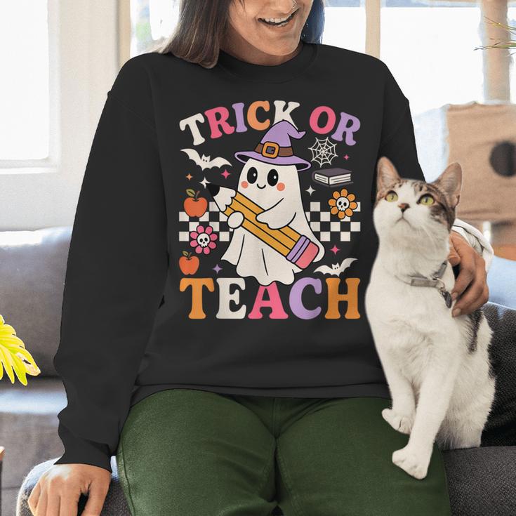 Retro Floral Ghost Trick Or Teach Groovy Teacher Halloween Women Crewneck Sweatshirt, Groovy Teacher Sweatshirts, gift for family, gift for coworker Retro Floral Ghost Trick Or Teach Groovy Teacher Halloween Women Crewneck Sweatshirt, Groovy Teacher Sweatshirts, gift for family, gift for coworker