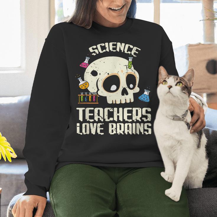 Science Teachers Love Brains Teachers Halloween Women Crewneck Sweatshirt, Science Teacher Sweatshirts, gift for family, gift for coworker