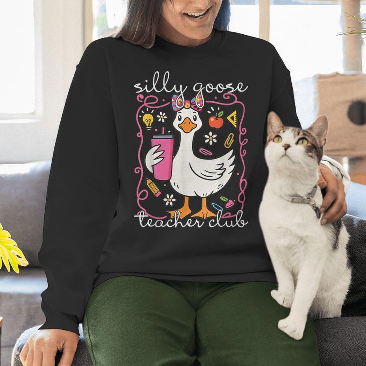 Silly Goose Teacher Club Animal Lover Groovy Teacher Women Crewneck Sweatshirt, Groovy Teacher Sweatshirts, gift for family, gift for coworker Silly Goose Teacher Club Animal Lover Groovy Teacher Women Crewneck Sweatshirt, Groovy Teacher Sweatshirts, gift for family, gift for coworker
