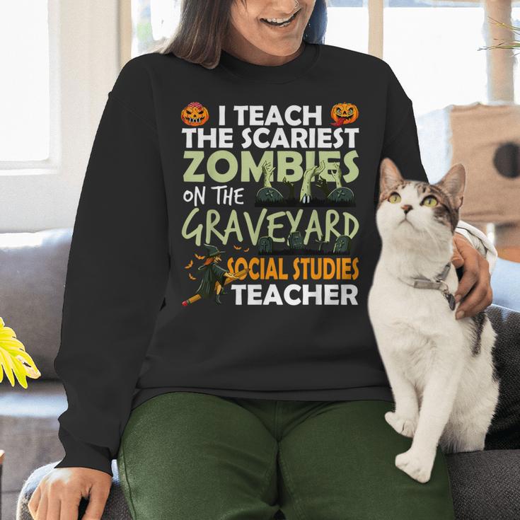 Social Studies Teacher Teach Scariest Zombies On Graveyard For Men Women Women Crewneck Sweatshirt, gift for family, gift for coworker Social Studies Teacher Teach Scariest Zombies On Graveyard For Men Women Women Crewneck Sweatshirt, gift for family, gift for coworker