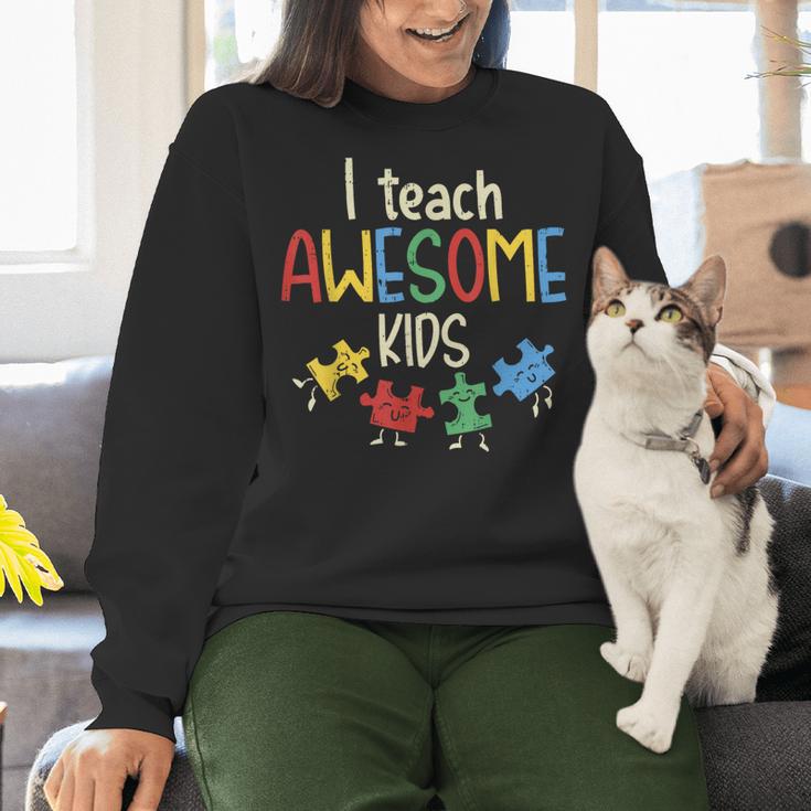 I Teach Awesome Kids Shirt Autism Special Education Teacher Women Crewneck Sweatshirt, gift for family, gift for coworker