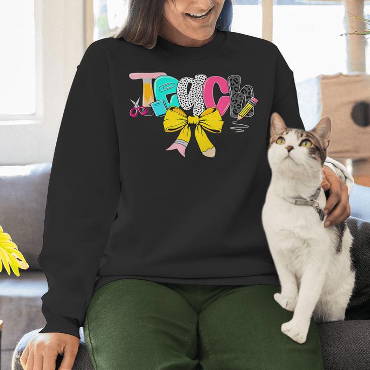 Teach Coquette Bow Teacher Back To School Happy First Day Women Crewneck Sweatshirt, gift for family, gift for coworker Teach Coquette Bow Teacher Back To School Happy First Day Women Crewneck Sweatshirt, gift for family, gift for coworker