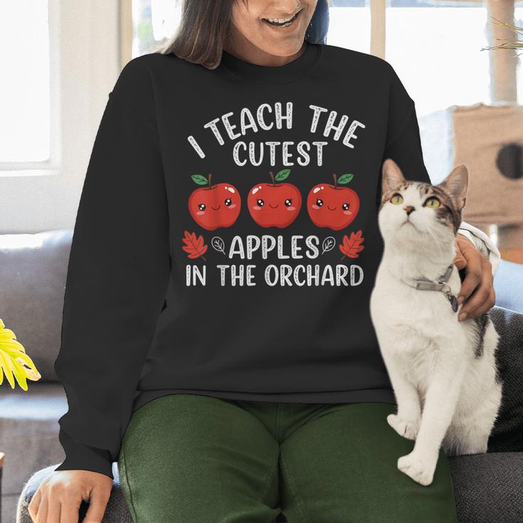 I Teach The Cutest Apples In The Orchard Cute Fall Teacher Women Crewneck Sweatshirt, gift for family, gift for coworker I Teach The Cutest Apples In The Orchard Cute Fall Teacher Women Crewneck Sweatshirt, gift for family, gift for coworker