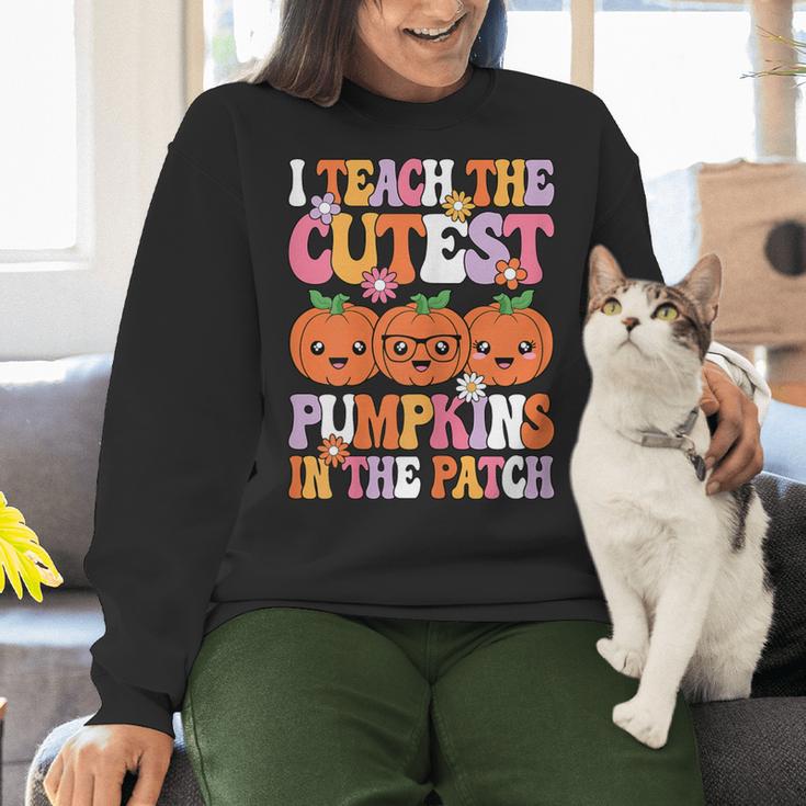 I Teach The Cutest Pumpkins Halloween Fall Teacher Women Women Crewneck Sweatshirt, gift for family, gift for coworker I Teach The Cutest Pumpkins Halloween Fall Teacher Women Women Crewneck Sweatshirt, gift for family, gift for coworker