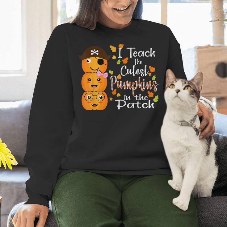 I Teach The Cutest Pumpkins Halloween Shirt For Teachers Women Crewneck Sweatshirt, gift for family, gift for coworker I Teach The Cutest Pumpkins Halloween Shirt For Teachers Women Crewneck Sweatshirt, gift for family, gift for coworker