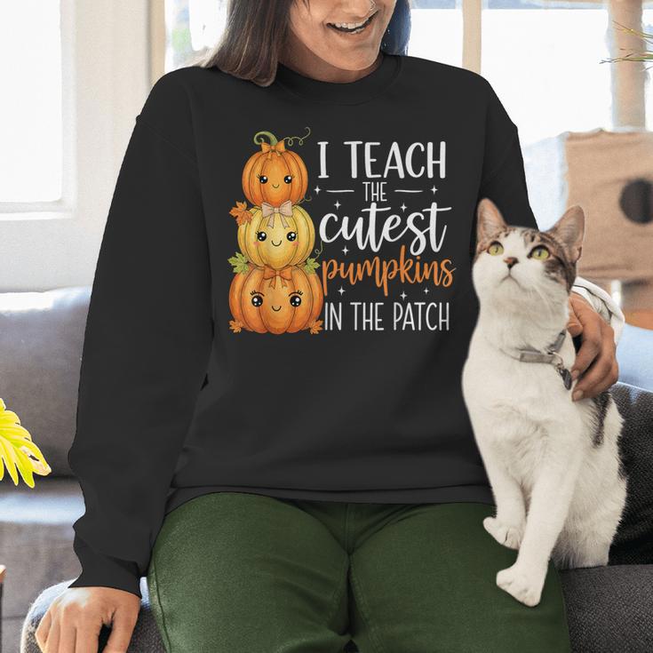 I Teach The Cutest Pumpkins In The Patch Fall Autumn Teacher Women Crewneck Sweatshirt, gift for family, gift for coworker I Teach The Cutest Pumpkins In The Patch Fall Autumn Teacher Women Crewneck Sweatshirt, gift for family, gift for coworker