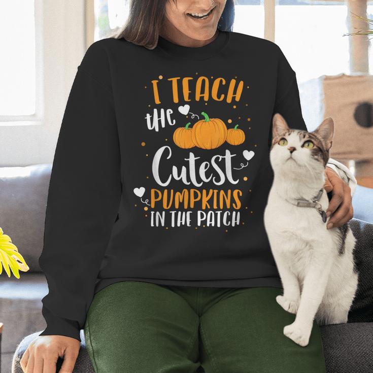 I Teach The Cutest Pumpkins In The Patch Teacher School For Men Women Kids Women Crewneck Sweatshirt, gift for family, gift for coworker I Teach The Cutest Pumpkins In The Patch Teacher School For Men Women Kids Women Crewneck Sweatshirt, gift for family, gift for coworker