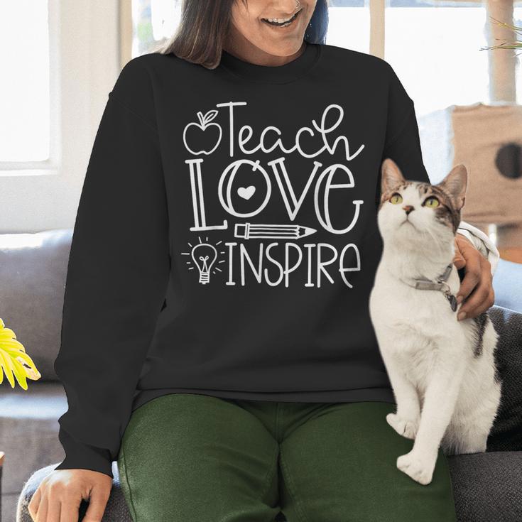Teach Love Inspire Retro Teacher Kids Back To School Women Crewneck Sweatshirt, gift for family, gift for coworker Teach Love Inspire Retro Teacher Kids Back To School Women Crewneck Sweatshirt, gift for family, gift for coworker