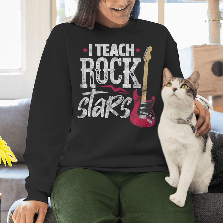 I Teach Rock Stars Music Teacher Guitar Player Women Crewneck Sweatshirt, gift for family, gift for coworker