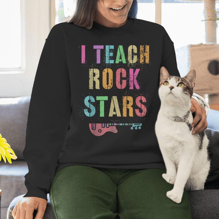 I TEACH ROCKSTARS Band Vibes Teacher Rocks My Music Teaching Women Crewneck Sweatshirt, gift for family, gift for coworker I TEACH ROCKSTARS Band Vibes Teacher Rocks My Music Teaching Women Crewneck Sweatshirt, gift for family, gift for coworker