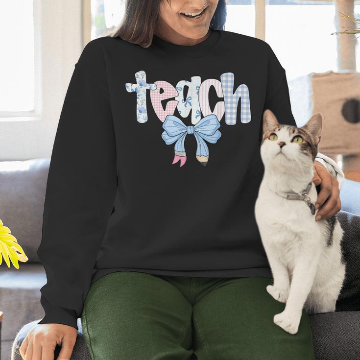 Teach Teacher Coquette Bow Pencil Back To School First Day Women Crewneck Sweatshirt, gift for family, gift for coworker Teach Teacher Coquette Bow Pencil Back To School First Day Women Crewneck Sweatshirt, gift for family, gift for coworker