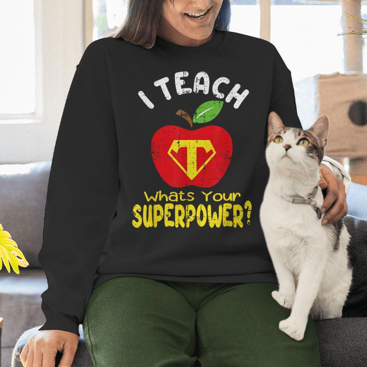 I Teach What's Your Superpower Superhero Teacher Women Crewneck Sweatshirt, gift for family, gift for coworker