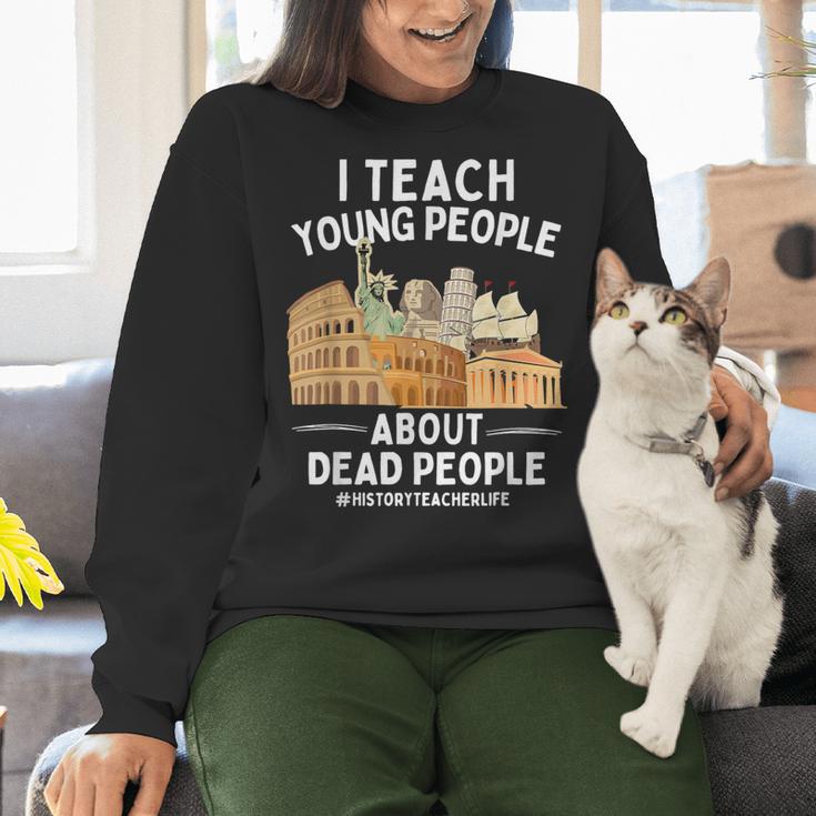 I Teach Young People About Dead People History Teachers Women Crewneck Sweatshirt, History Teacher Sweatshirts, gift for family, gift for coworker I Teach Young People About Dead People History Teachers Women Crewneck Sweatshirt, History Teacher Sweatshirts, gift for family, gift for coworker