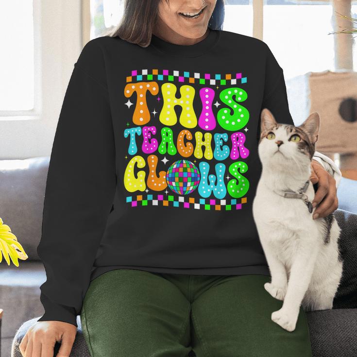 This Teacher 80s 90s Teachers's Day Glows Last Day Of School Women Crewneck Sweatshirt, 90s Teacher Sweatshirts, gift for family, gift for coworker This Teacher 80s 90s Teachers's Day Glows Last Day Of School Women Crewneck Sweatshirt, 90s Teacher Sweatshirts, gift for family, gift for coworker