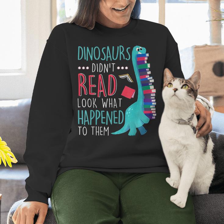 Teacher Dinosaurs Didnt Read Look What Happened Book Reading Women Crewneck Sweatshirt, gift for family, gift for coworker Teacher Dinosaurs Didnt Read Look What Happened Book Reading Women Crewneck Sweatshirt, gift for family, gift for coworker