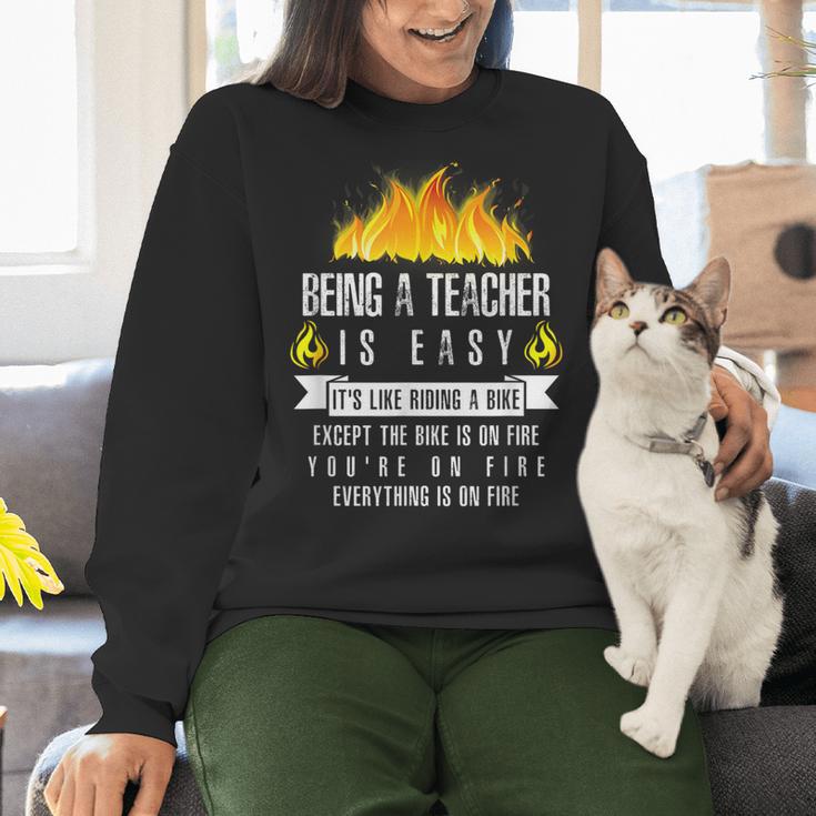 Being a Teacher Is Easy Everything Is On Fire T-Shirt For Men Women Kids Women Crewneck Sweatshirt, gift for family, gift for coworker Being a Teacher Is Easy Everything Is On Fire T-Shirt For Men Women Kids Women Crewneck Sweatshirt, gift for family, gift for coworker