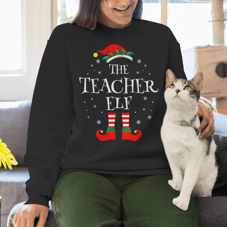 The Teacher Elf Christmas Family Matching Group Xmas Women Crewneck Sweatshirt, gift for family, gift for coworker The Teacher Elf Christmas Family Matching Group Xmas Women Crewneck Sweatshirt, gift for family, gift for coworker
