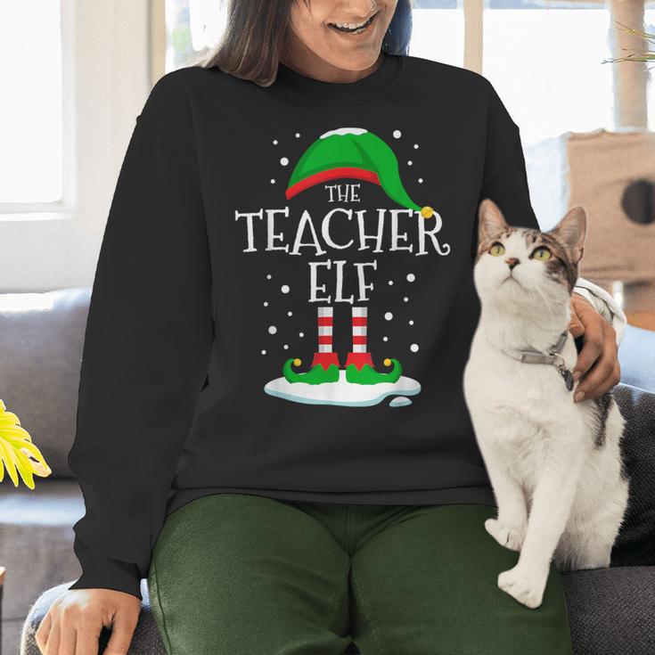 The Teacher Elf Christmas Family Matching Xmas Group For Men Women Women Crewneck Sweatshirt, gift for family, gift for coworker The Teacher Elf Christmas Family Matching Xmas Group For Men Women Women Crewneck Sweatshirt, gift for family, gift for coworker
