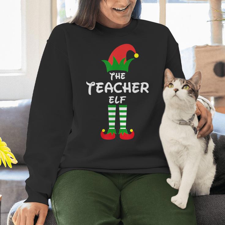 The Teacher Elf Family Matching Group Idea Christmas Women Crewneck Sweatshirt, gift for family, gift for coworker