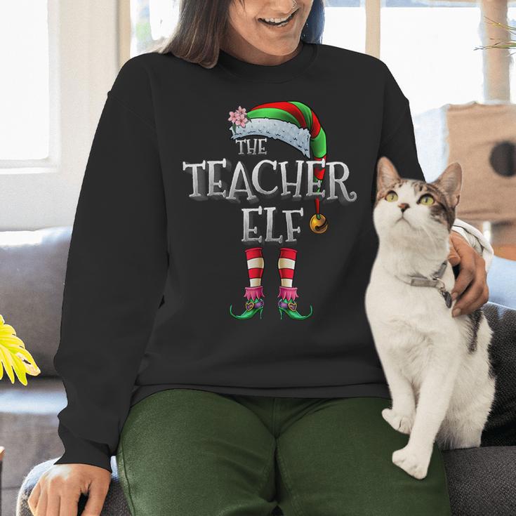 The Teacher Elf Shirt Matching Family Christmas Elf Men Women Kids Women Crewneck Sweatshirt, gift for family, gift for coworker The Teacher Elf Shirt Matching Family Christmas Elf Men Women Kids Women Crewneck Sweatshirt, gift for family, gift for coworker