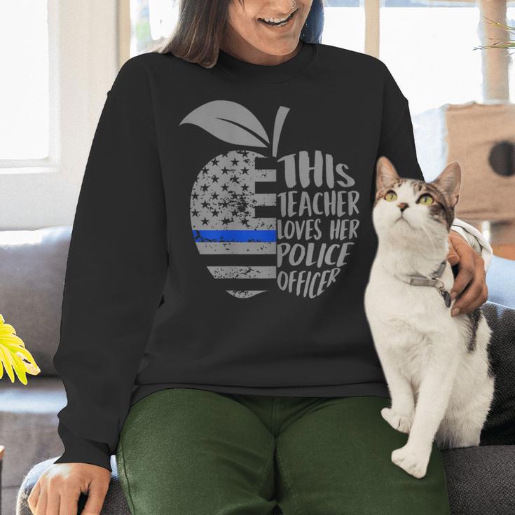 This Teacher Loves Her Police Officer Wife Saying Women Crewneck Sweatshirt, gift for family, gift for coworker
