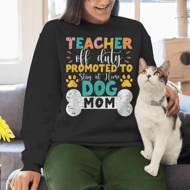 Teacher Off Duty Promoted To Stay At Home Dog Mom Teachers Women Crewneck Sweatshirt, gift for family, gift for coworker Teacher Off Duty Promoted To Stay At Home Dog Mom Teachers Women Crewneck Sweatshirt, gift for family, gift for coworker