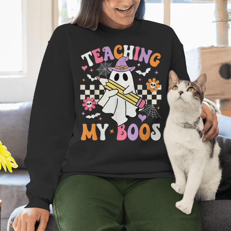 Teaching My Boos Ghost Teacher Cute Groovy Halloween Teacher Women Crewneck Sweatshirt, Groovy Teacher Sweatshirts, gift for family, gift for coworker Teaching My Boos Ghost Teacher Cute Groovy Halloween Teacher Women Crewneck Sweatshirt, Groovy Teacher Sweatshirts, gift for family, gift for coworker