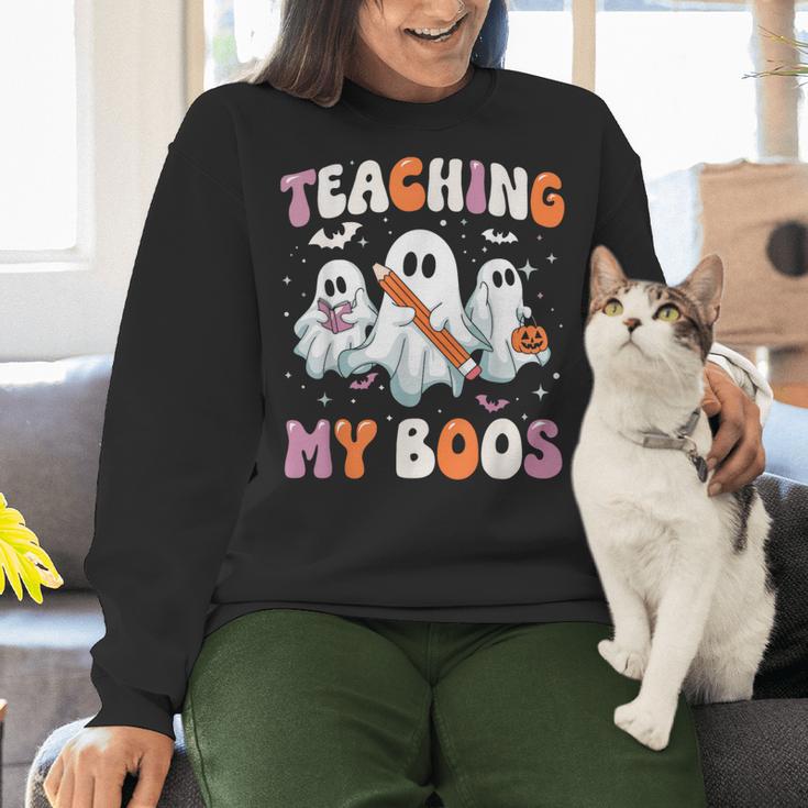 Teaching My Boos Teacher Cute Ghost Teacher Halloween Women Crewneck Sweatshirt, gift for family, gift for coworker Teaching My Boos Teacher Cute Ghost Teacher Halloween Women Crewneck Sweatshirt, gift for family, gift for coworker