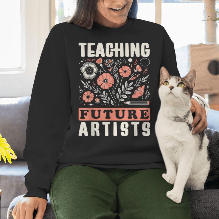 Teaching Future Artists For Art Teachers And Lovers For Men Women Girls Kids Women Crewneck Sweatshirt, gift for family, gift for coworker Teaching Future Artists For Art Teachers And Lovers For Men Women Girls Kids Women Crewneck Sweatshirt, gift for family, gift for coworker
