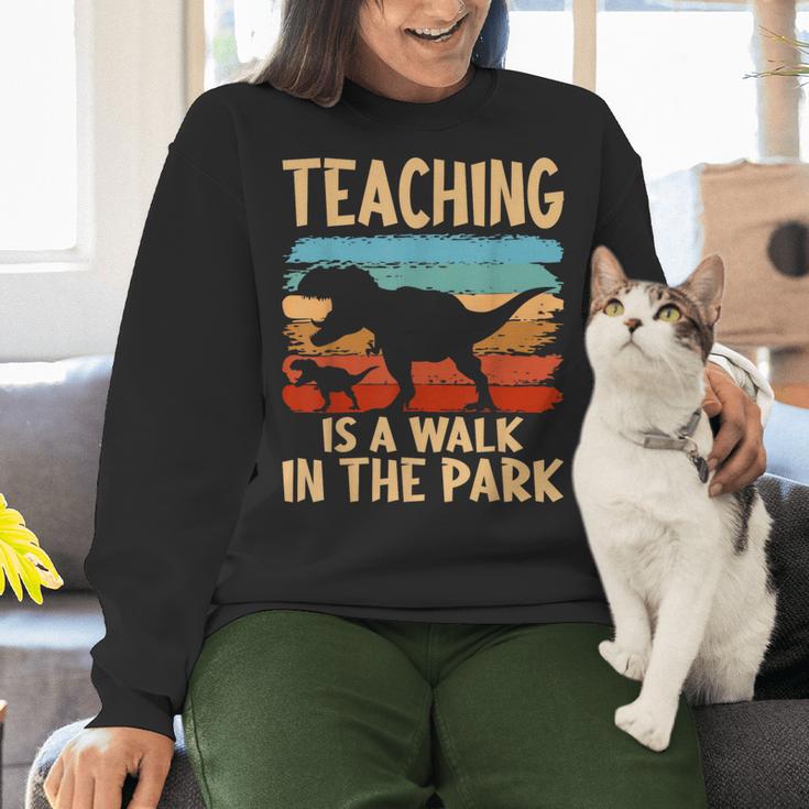 Teaching Is a Walk In Park Dinosaur Teacher Women Crewneck Sweatshirt, gift for family, gift for coworker