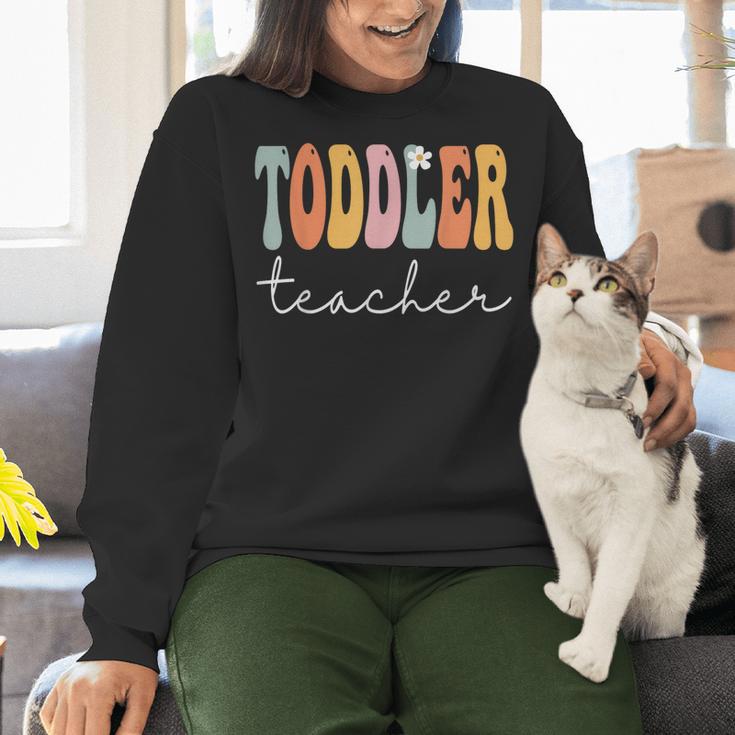Toddler Teacher Retro Groovy Women Happy First Day Of School Women Crewneck Sweatshirt, Groovy Teacher Sweatshirts, gift for family, gift for coworker Toddler Teacher Retro Groovy Women Happy First Day Of School Women Crewneck Sweatshirt, Groovy Teacher Sweatshirts, gift for family, gift for coworker
