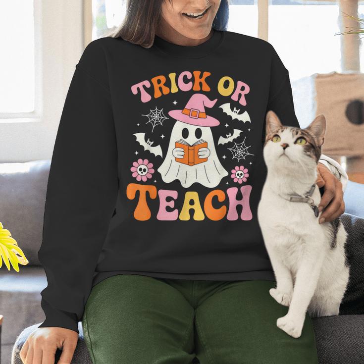 Trick Or Teach Cute Floral Ghost Teacher Halloween Costume Women Crewneck Sweatshirt, gift for family, gift for coworker
