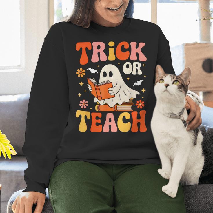 Trick Or Teach Halloween Shirt For Teacher Kids Floral Ghost Women Crewneck Sweatshirt, gift for family, gift for coworker Trick Or Teach Halloween Shirt For Teacher Kids Floral Ghost Women Crewneck Sweatshirt, gift for family, gift for coworker