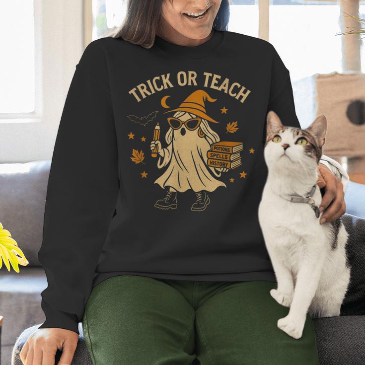 Trick Or Teach Halloween Teacher Women Crewneck Sweatshirt, gift for family, gift for coworker Trick Or Teach Halloween Teacher Women Crewneck Sweatshirt, gift for family, gift for coworker