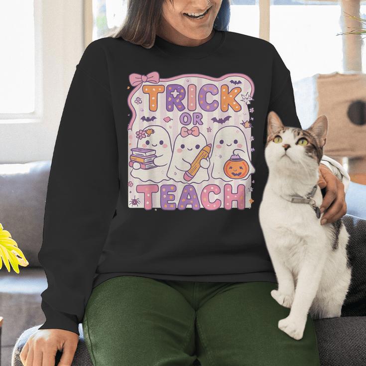Trick Or Teach Retro Halloween Teacher Look Women Crewneck Sweatshirt, gift for family, gift for coworker Trick Or Teach Retro Halloween Teacher Look Women Crewneck Sweatshirt, gift for family, gift for coworker