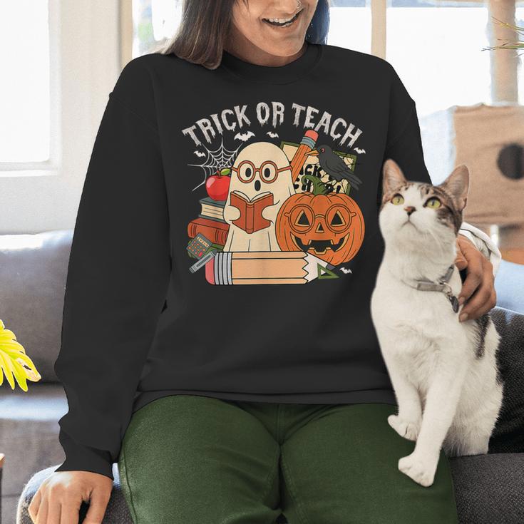 Trick Or Teach Retro Halloween Teacher Women Men Costume Women Crewneck Sweatshirt, gift for family, gift for coworker Trick Or Teach Retro Halloween Teacher Women Men Costume Women Crewneck Sweatshirt, gift for family, gift for coworker